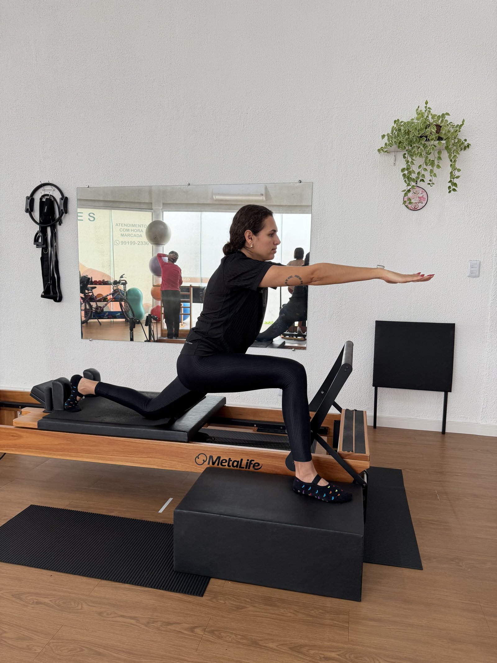 Detalhe do ambiente acolhedor do estúdio New Life Pilates